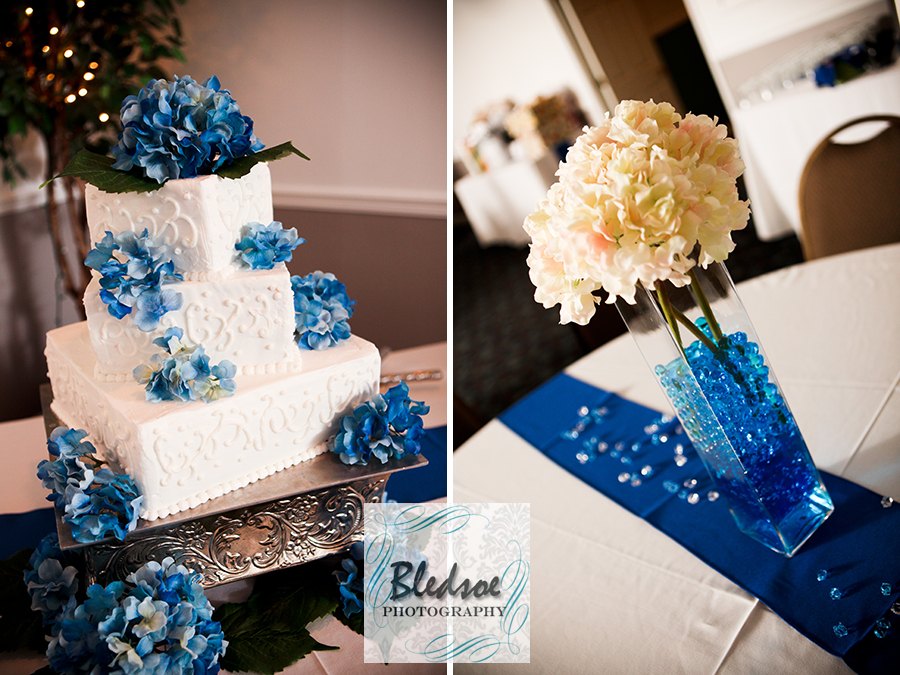Caronlina blue and white wedding cake and centerpieces at Rothchild Catering.