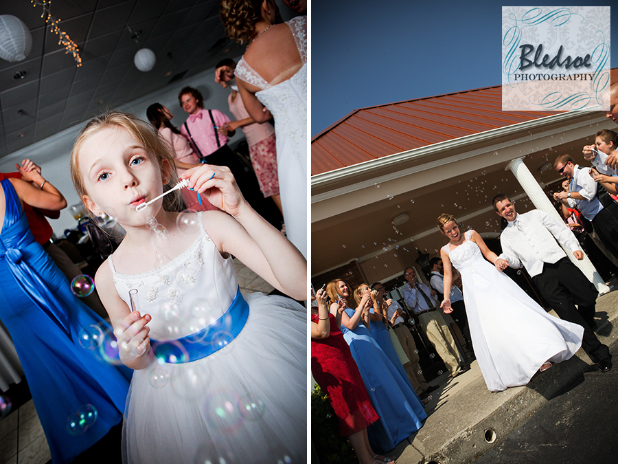 Grand bubble exit at wedding reception at Rothchild Catering Center.