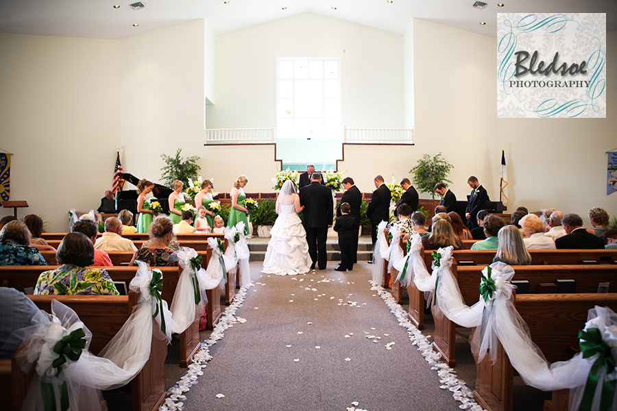Shot of wedding party at altar at Friendship Baptist Church