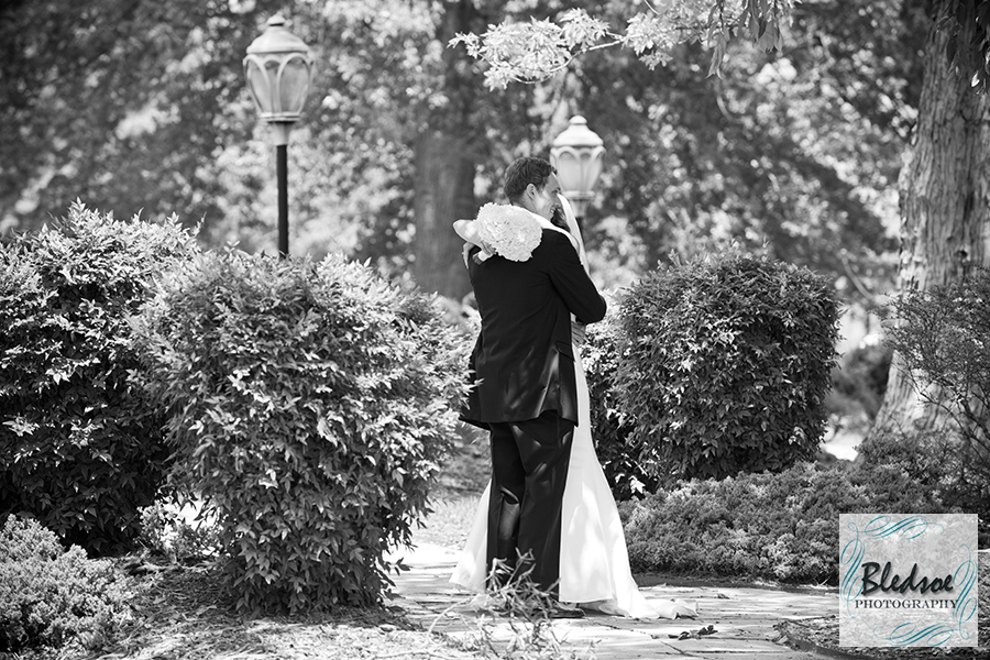 Bride and groom hugging after ceremony. Wedding at The Dent House in Chattanooga, TN. © Bledsoe Photography