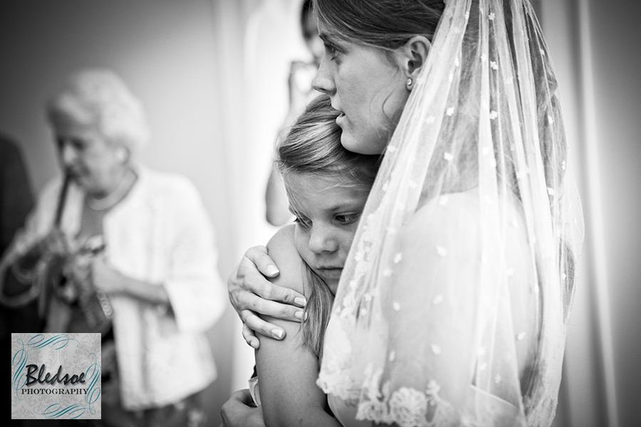 Bride hugging her sister.  Wedding at The Dent House in Chattanooga, TN. © Bledsoe Photography