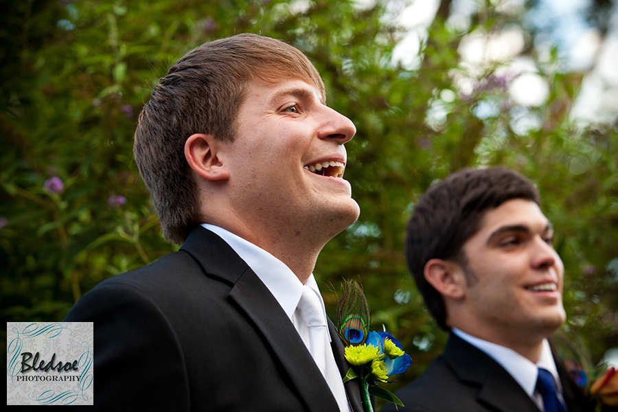 Groom smiling at bride at Pick Inn. © Bledsoe Photography