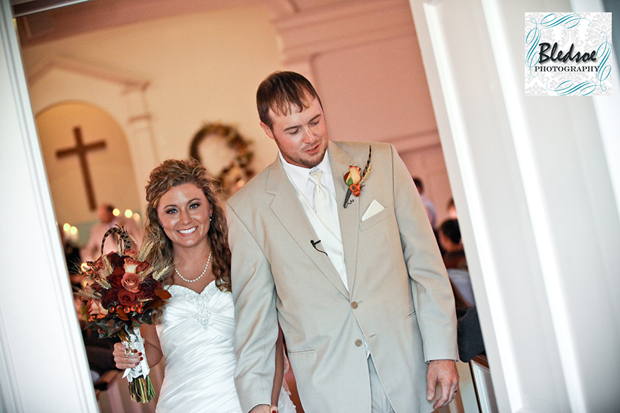 Bride and groom exiting church. Bledsoe Photography.  Franklin KY wedding photography