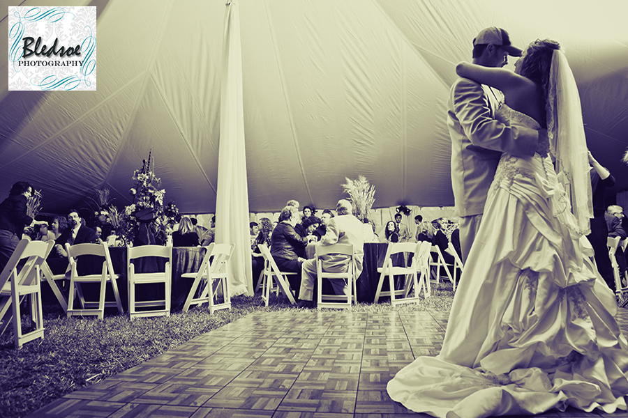 Bride and groom's first dance in tent. Bledsoe Photography.  Springfield, TN wedding photography