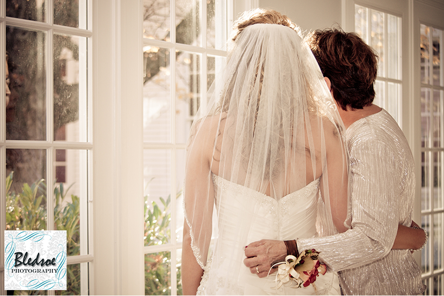 Bride and mother looking out window. Bledsoe Photography.  Franklin KY wedding photography