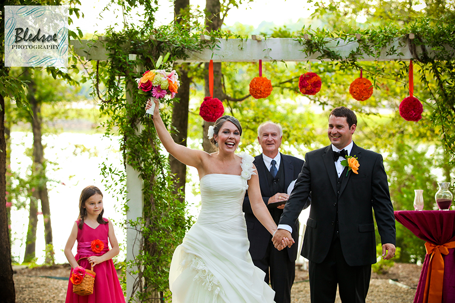 Bride and groom cheering down the aisle at Hunter Valley Farm, Knoxville wedding photographer