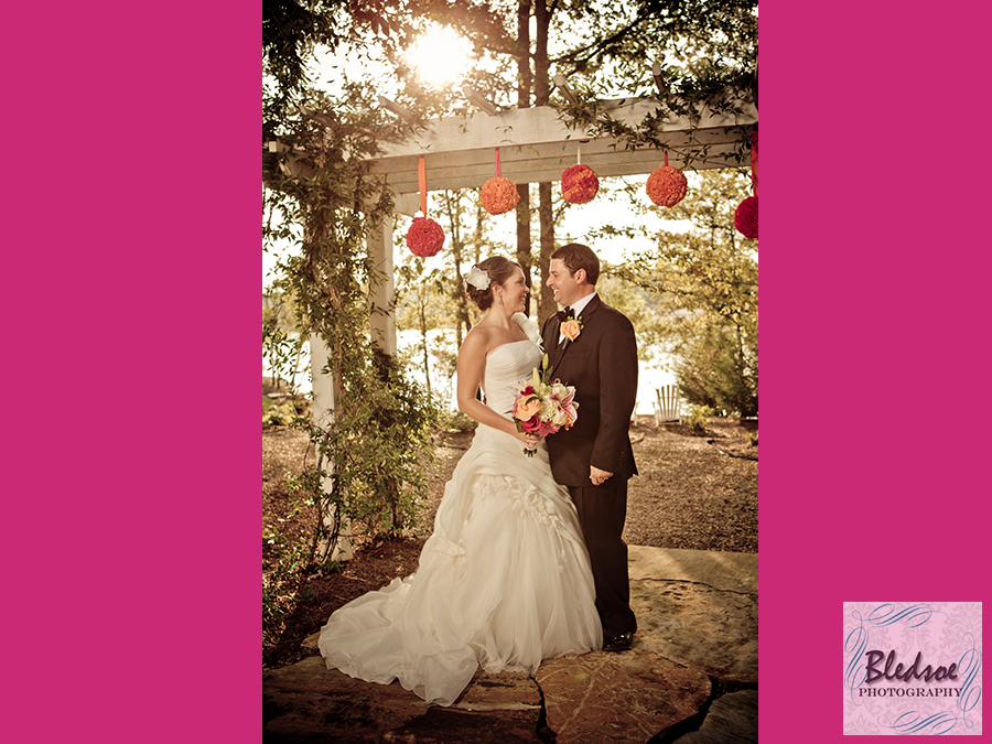 Bride and groom under the arbor at Hunter Valley Farm, Knoxville wedding photographer
