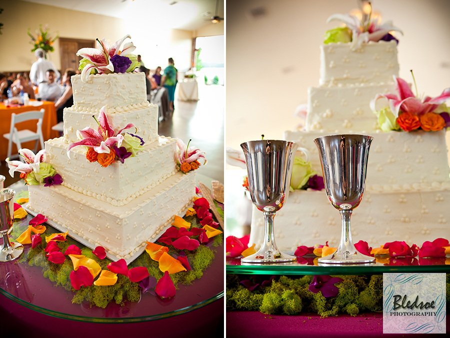 Wedding cake with fuschia and orange flowers at Hunter Valley Farm, Knoxville wedding photographer