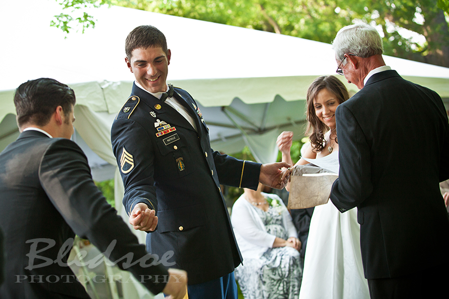 Marine and bride exchanging rings at Glenmore Mansion wedding. Knoxville Wedding Photographer. © Bledsoe Photography