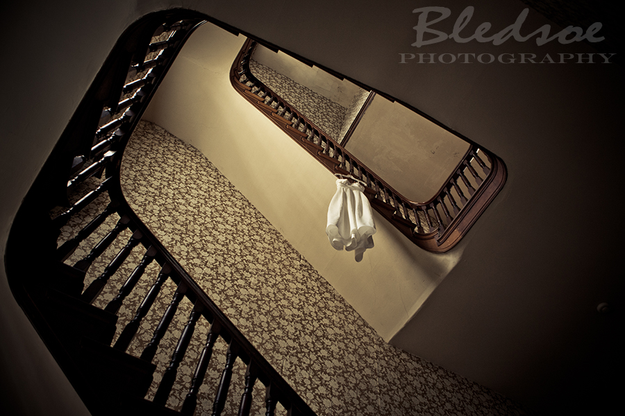 Wedding gown on staircase at Glenmore Mansion wedding. Knoxville Wedding Photographer. © Bledsoe Photography