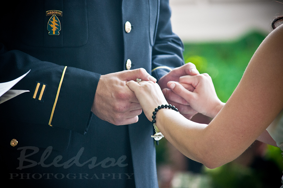 Close up of Marine groom and bride's hands during ceremony at Glenmore Mansion wedding. Knoxville Wedding Photographer. © Bledsoe Photography