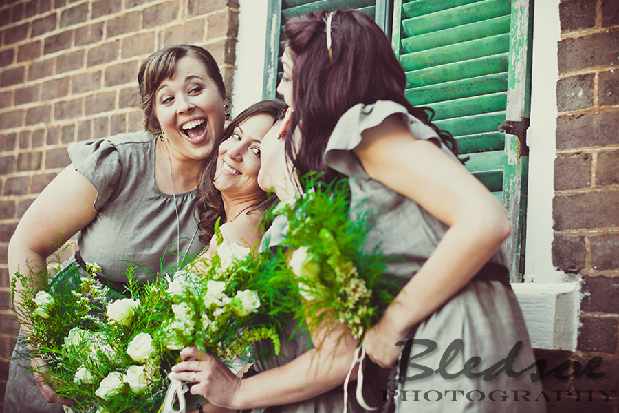 Bride with her bridesmaids in vintage gray dresses at Glenmore Mansion wedding. Knoxville Wedding Photographer. © Bledsoe Photography