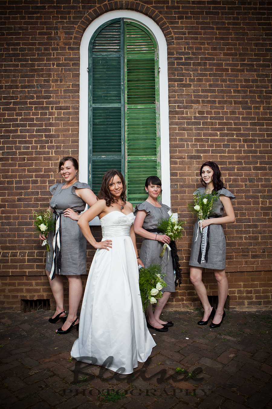 Bride and bridesmaids in vintage gray Etsy dresses at Glenmore Mansion wedding. Knoxville Wedding Photographer. © Bledsoe Photography