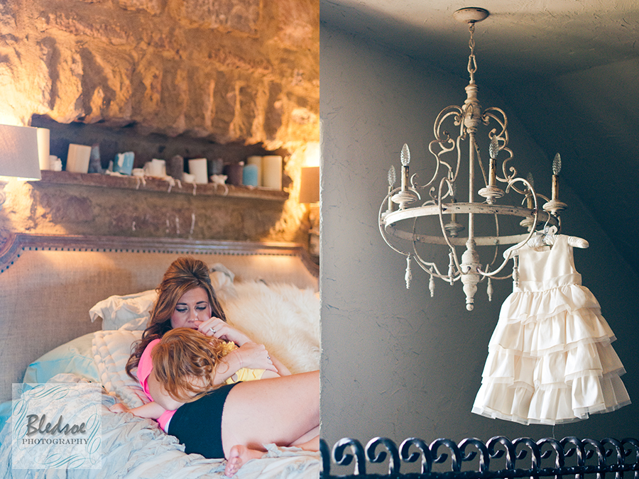 Sleeping flower girl and dress hanging from chandelier at Chateau Selah © Bledsoe Photography Knoxville