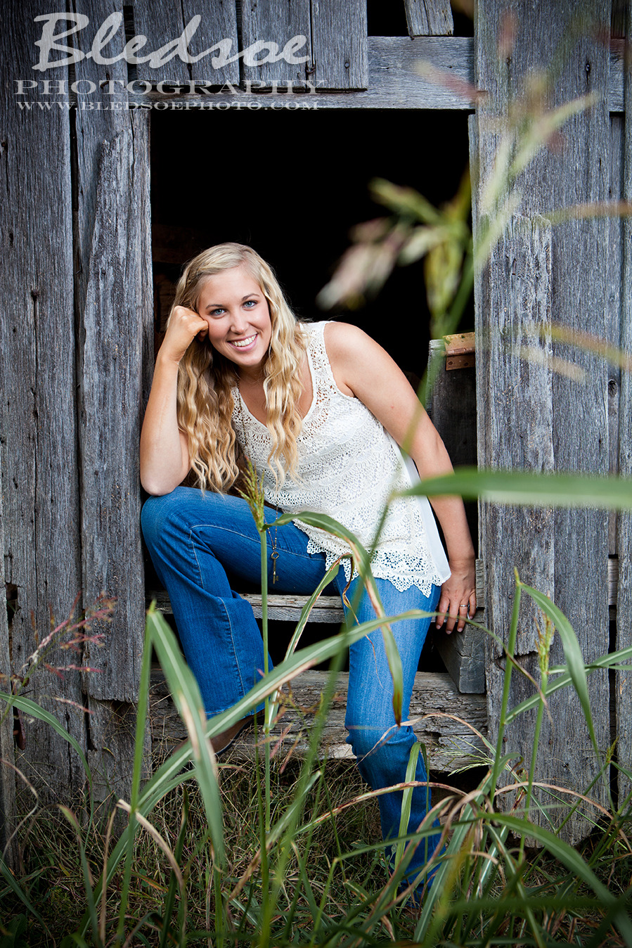 sarah bounds outdoor farm field tractor country senior portraits photos in knoxville Bledsoe Photography