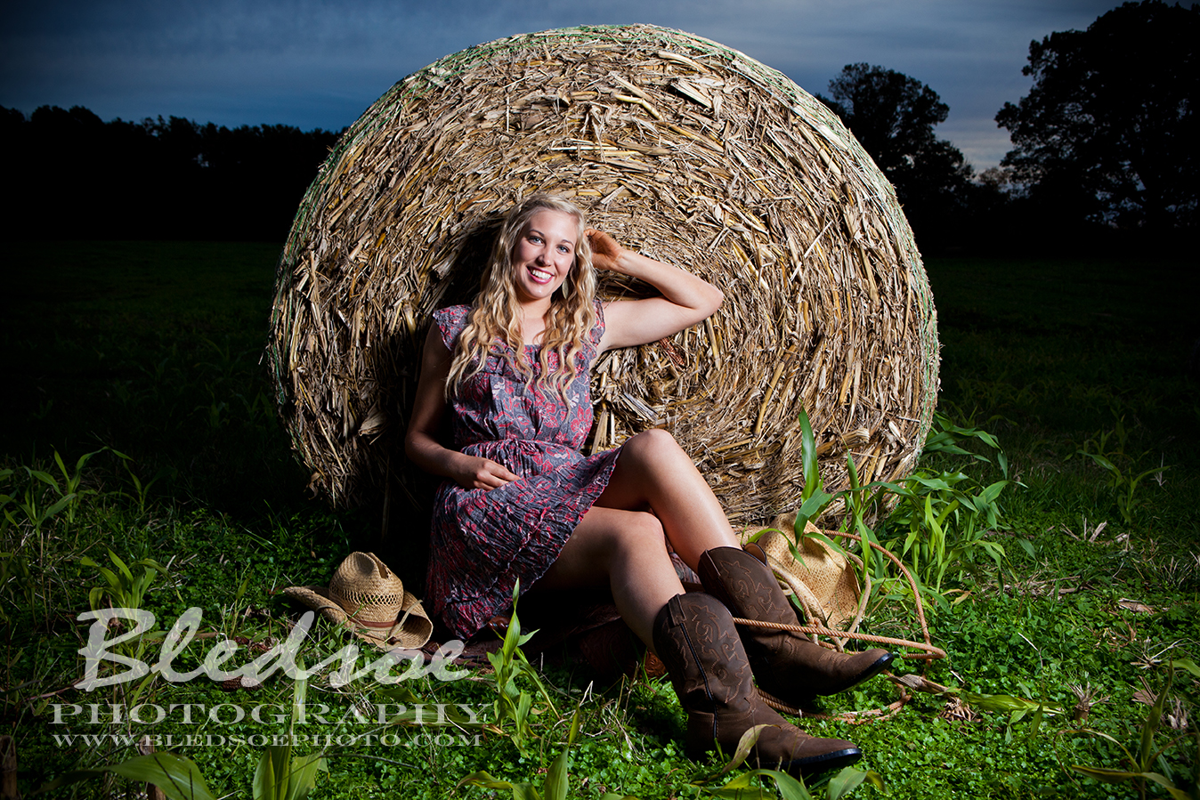 sarah bounds haybale outdoor farm field tractor country senior portraits photos in knoxville Bledsoe Photography