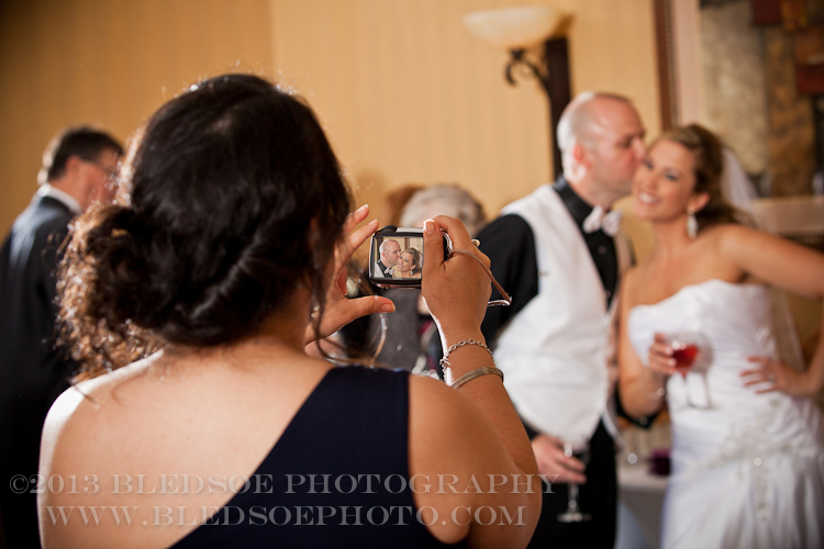 Bride and groom pose for guests, reception at downtown Hilton, knoxville wedding photographer, ©Bledsoe Photography