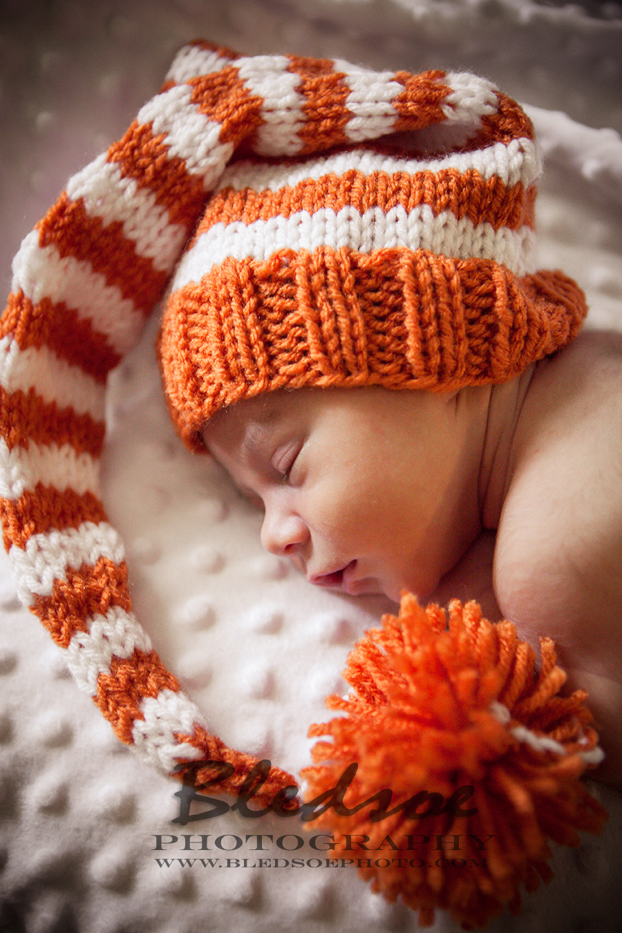 Newborn in orange and white UT Vols elf hat, Knoxville newborn photographer ©Bledsoe Photography