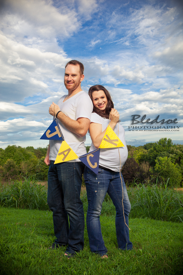 Knoxville maternity photographer, © Bledsoe Photography, baby belly photo session in a garden, Baby Jack flag banner