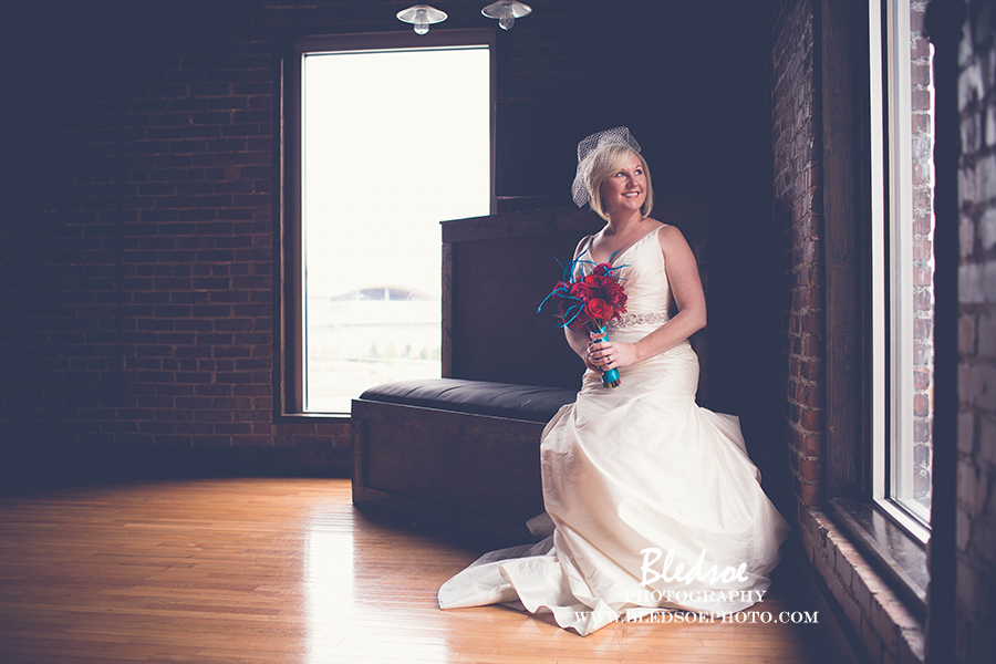 nashville-wedding-cannery-one-turquoise-red-feather-huskers-bouquet