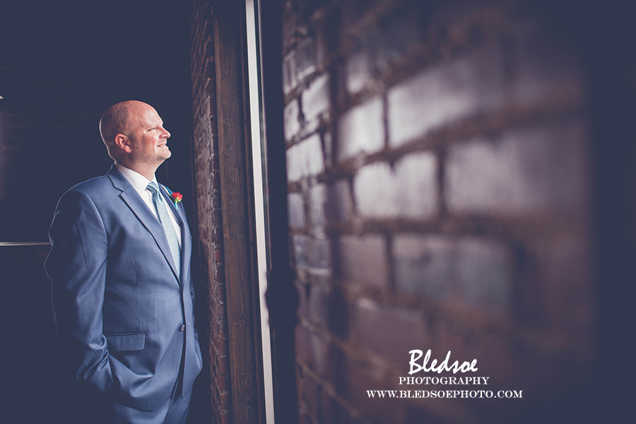 nashville-wedding-cannery-one-navy-suit-groom-waiting-for-bride-first-look