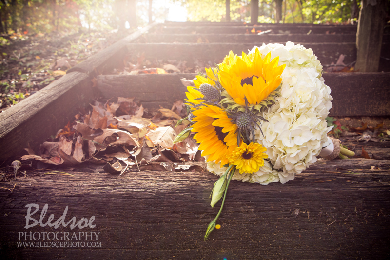 fall wedding reception at Hidden Hollow Resort, Chickamauga, GA, yellow daisy hydrangea bouquet, sunflare, Bledsoe Photography