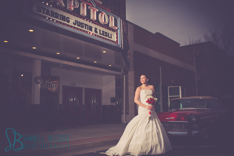 Old Hollywood glam art deco wedding at Capitol Theatre in Maryville, TN. Navy, red, gray wedding colors, Bridal portrait outside old theatre