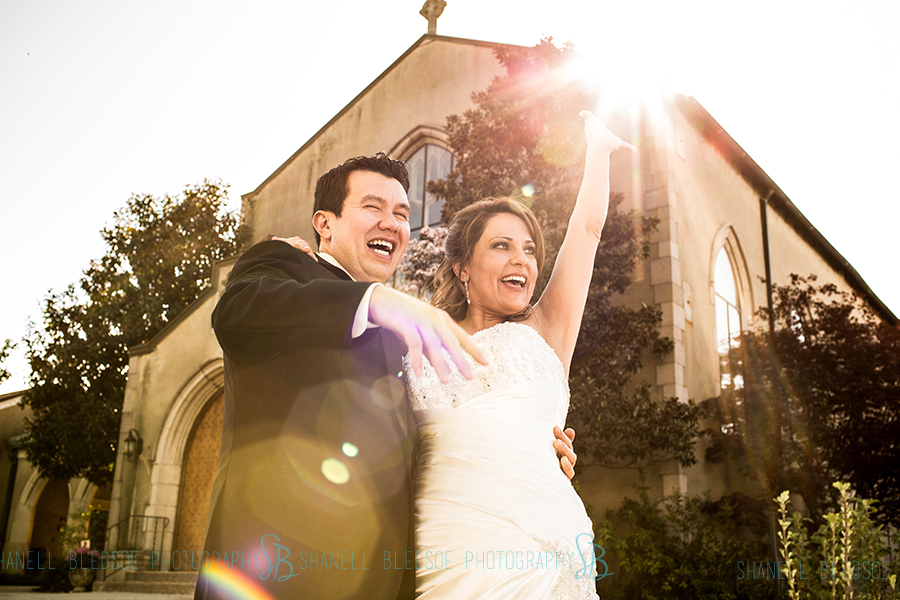 31-knoxville-arab-asian-wedding-photography-st-james-episcopal-sun-flare-waving-goodbye