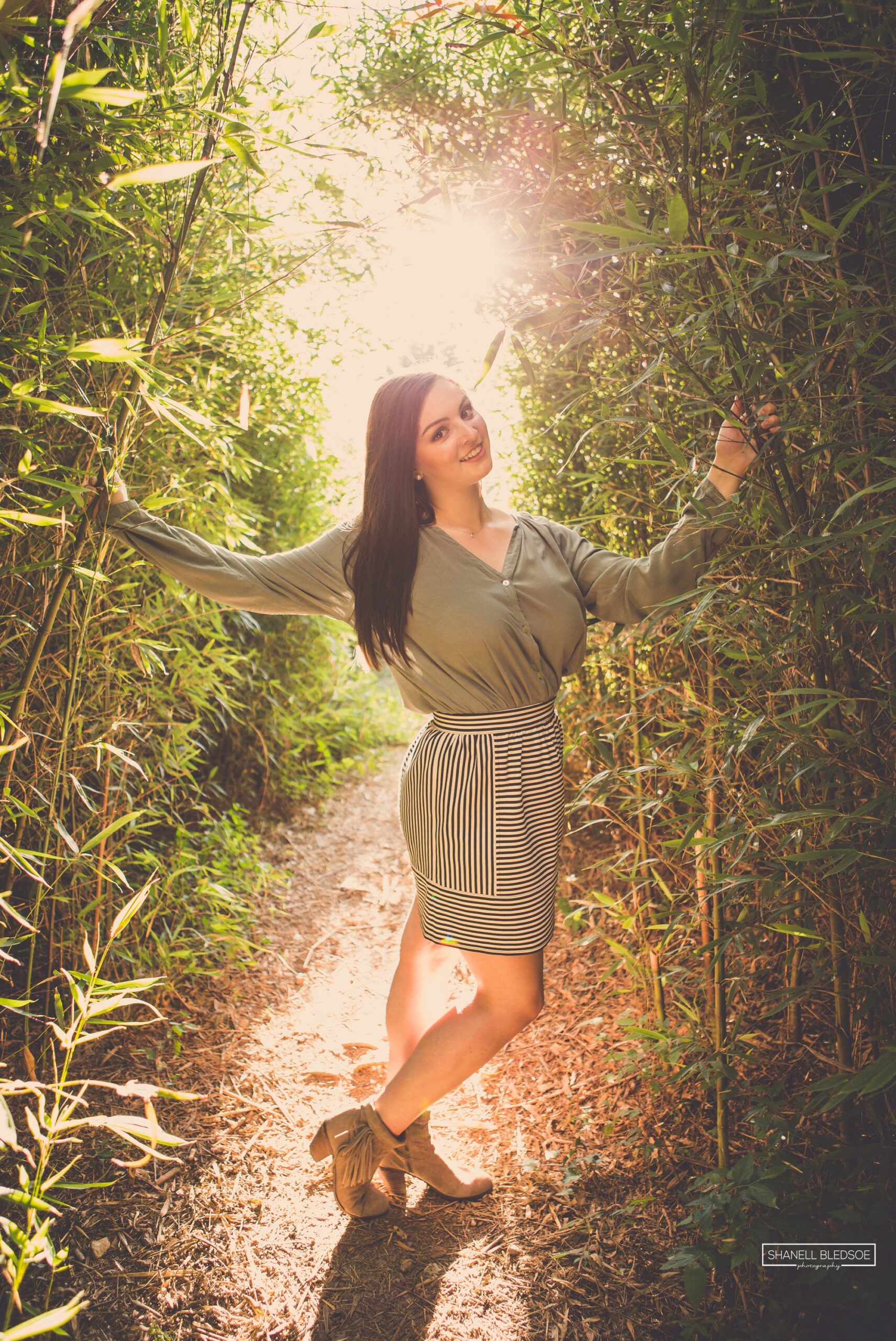 senior photos in a bamboo forest in Knoxville TN