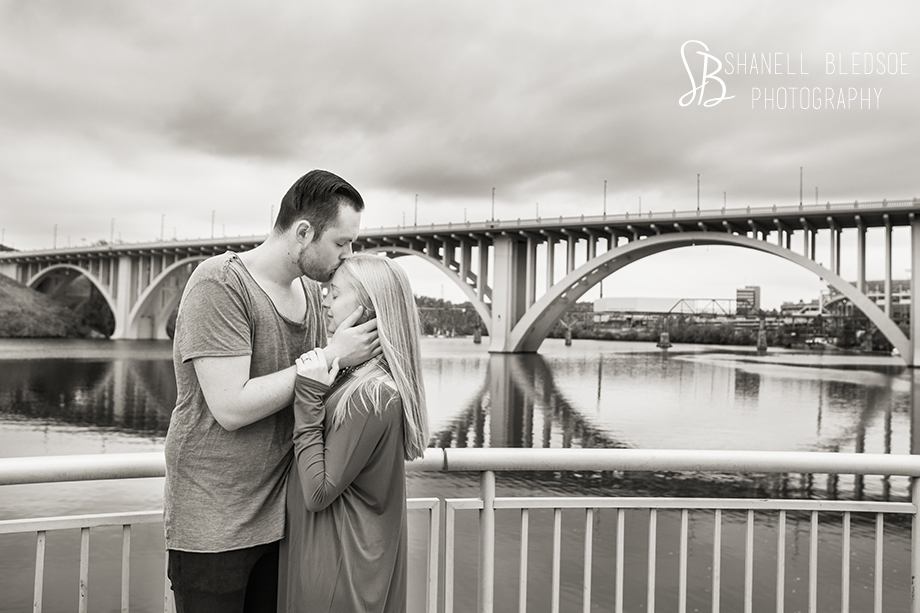 Hipster Couple kissing at Volunteer Landing. Shanell Bledsoe Photography, autumn engagement photos, Knoxville, Henley Street Bridge