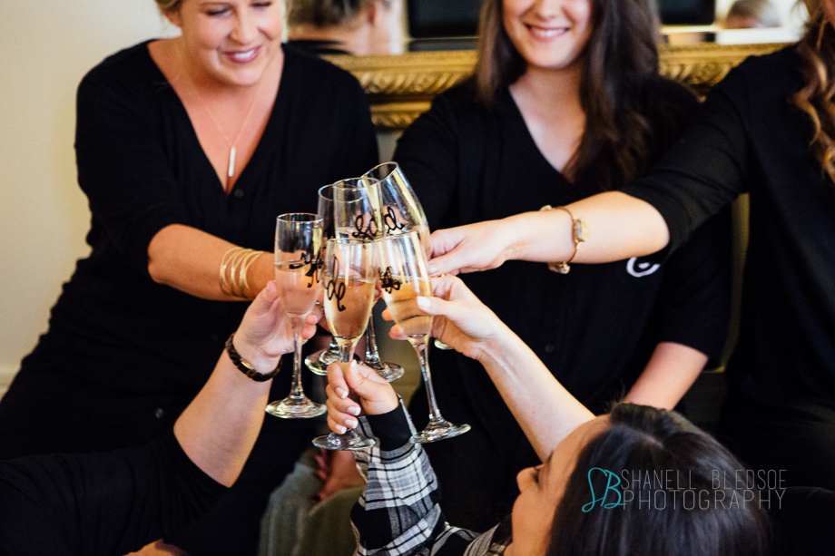 Knoxville wedding, Oliver Hotel, bride and bridesmaids toasting champagne, shanell bledsoe photography