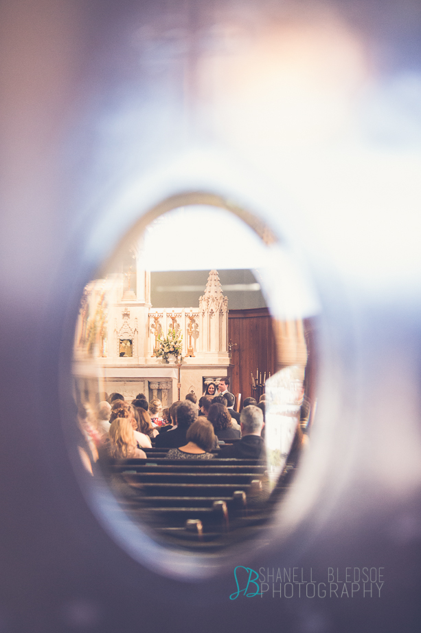 Knoxville wedding, ceremony through window, lmmaculate Conception Church, shanell bledsoe photography