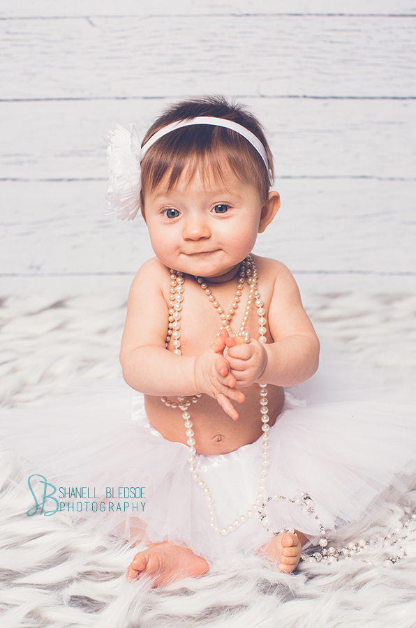 6 month old twin girl photos portrait session in Knoxville, TN. Shanell Bledsoe Photography, white tutu, pearls