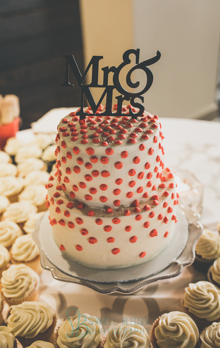 Coral and white wedding cake