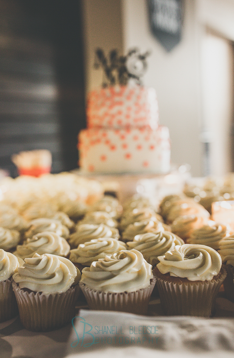 Coral and white wedding cupcakes
