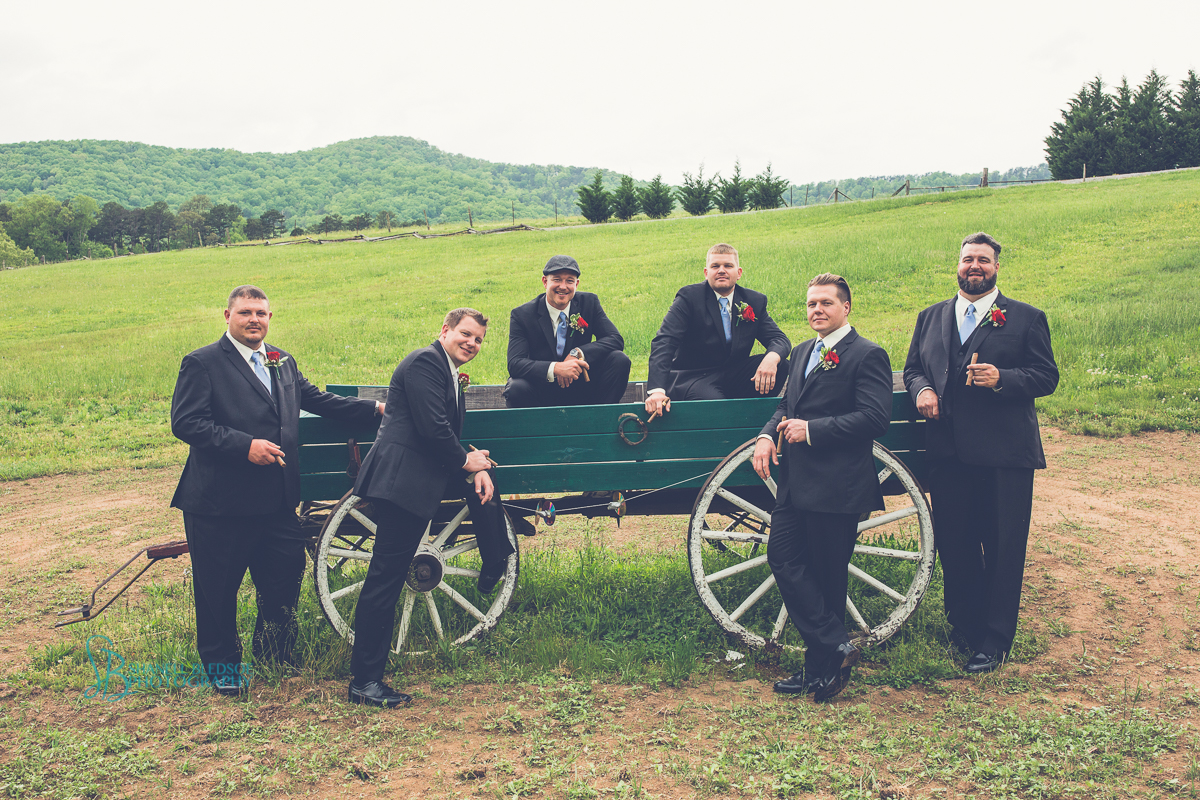 groomsmen with cigars pose around green wagon, sampson's hollow