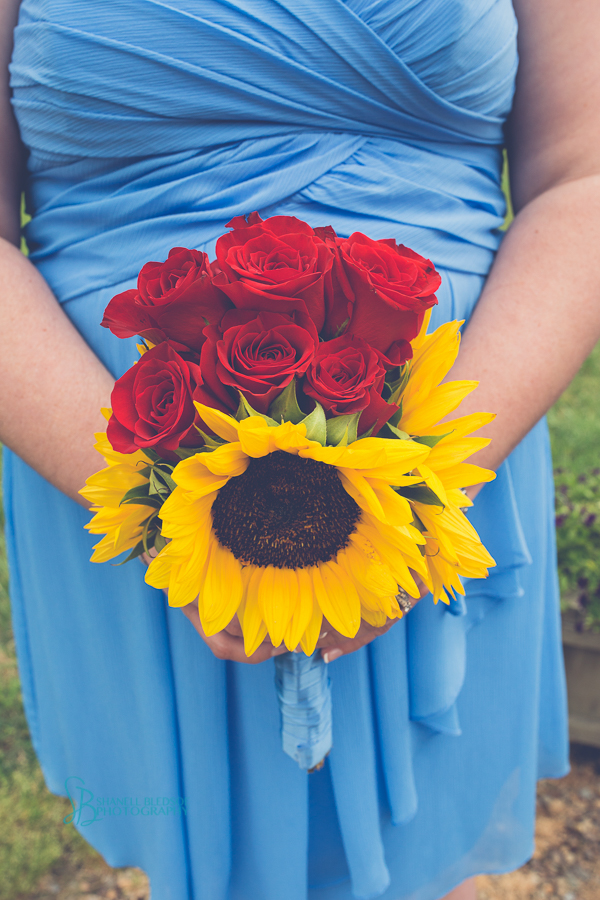 sunflower and red rose bridesmaid bouquet