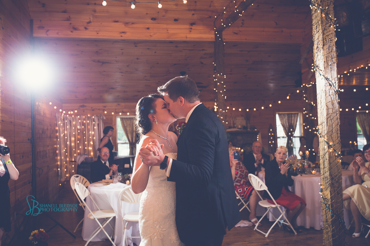 first dance as bride and groom in bonny red barn