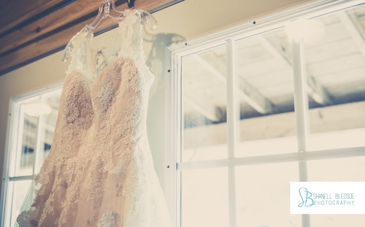 lace-wedding-dress-in-window