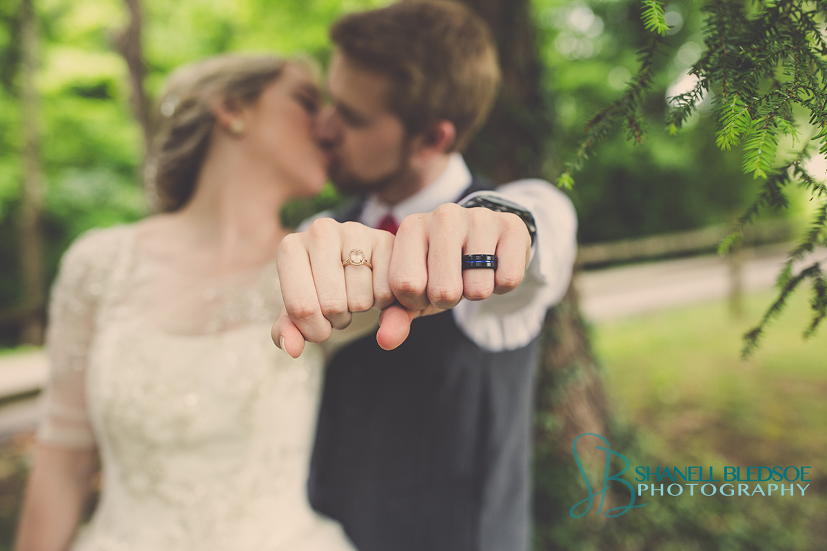 vintage-wedding-bride-groom-fist-bump-kiss