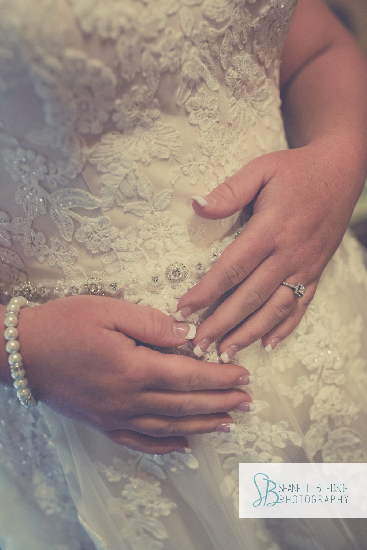 brides-hands-engagement-ring-closeup