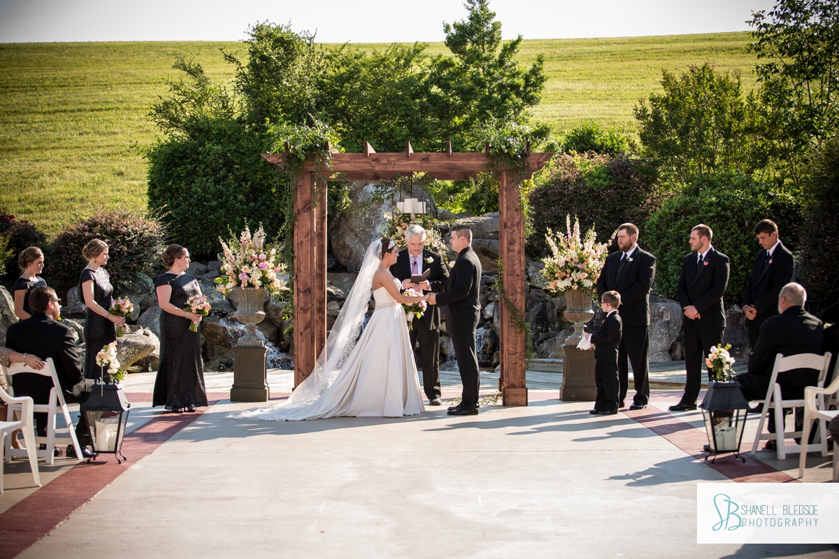 Waterfall wedding ceremony at The Stables in LaFollette, TN