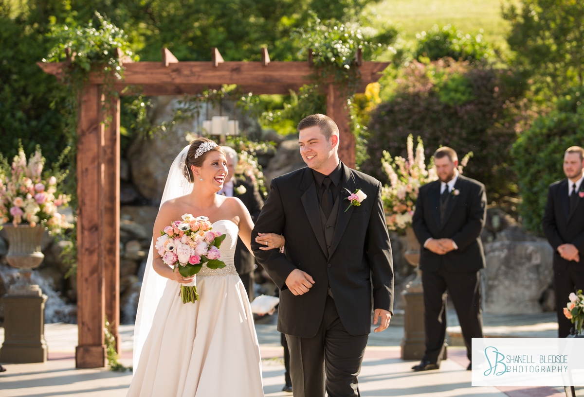 Recessional, custom arbor, waterfall wedding ceremony at The Stables in LaFollette, TN