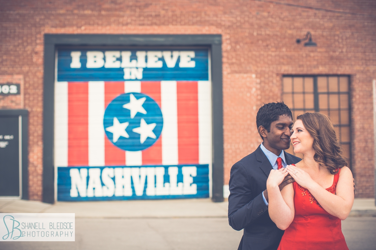 I believe in Nashville sign engagement photos at Marathon Music Works