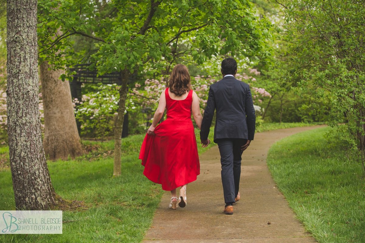 Walking in the rain at Cheekwood engagement photos session