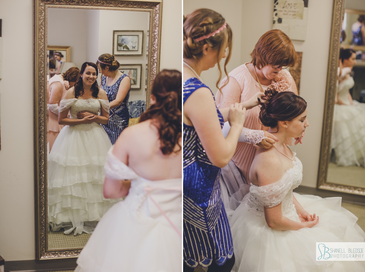 Helping bride get ready at historic southern railway station