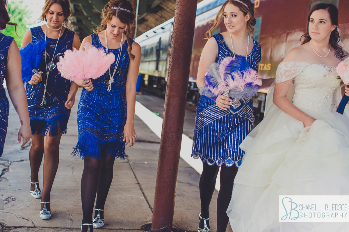 roaring 20s theme Wedding party on train cars at historic southern railway station