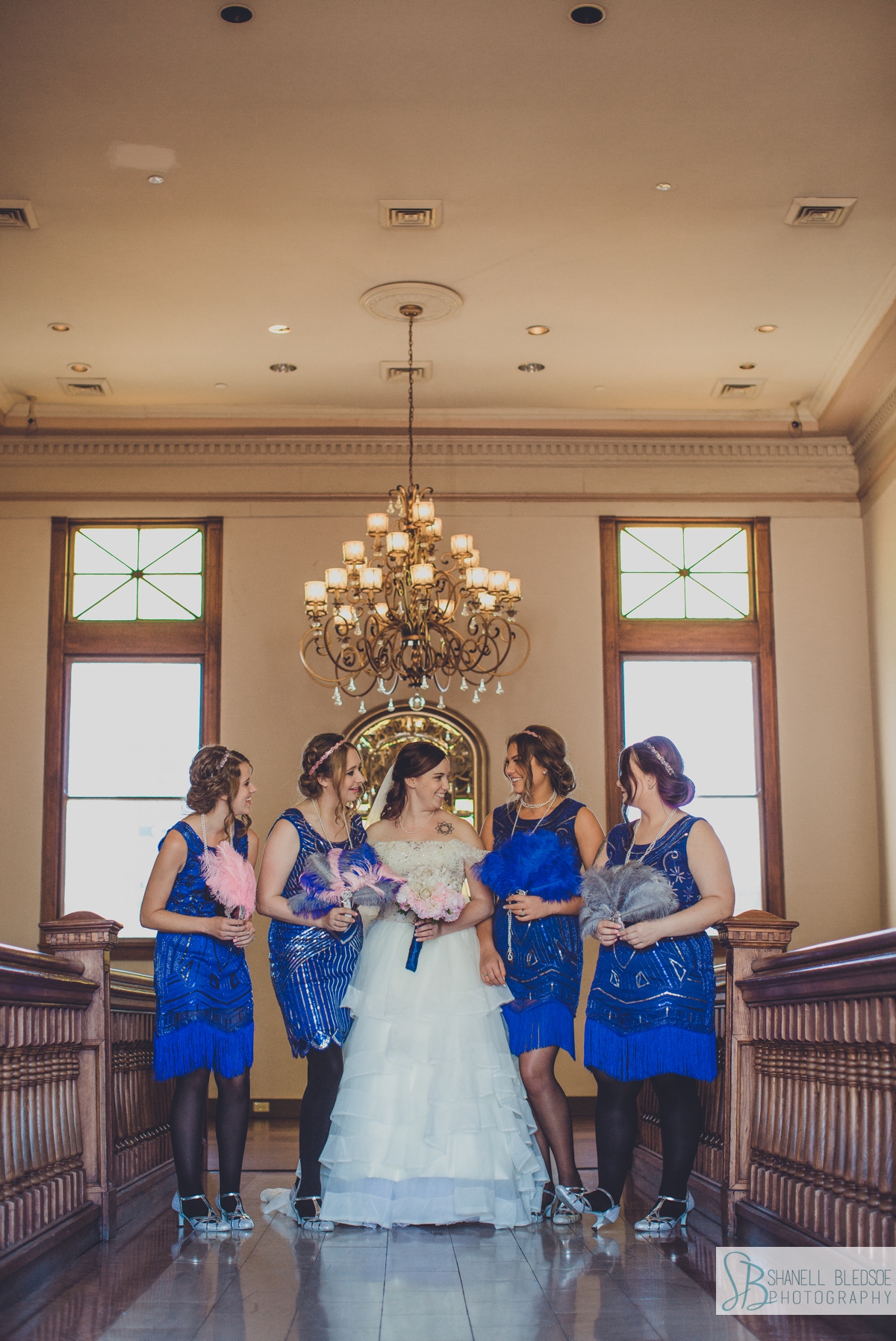 bride and bridesmaids portrait at historic southern railway station in Knoxville