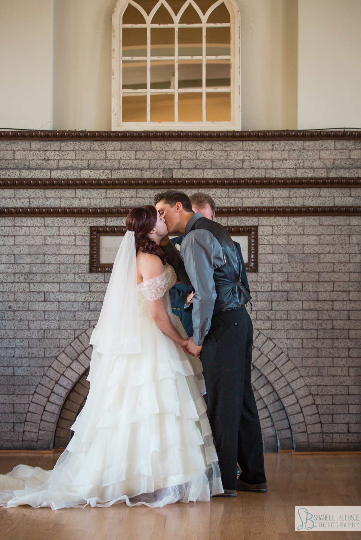 kiss wedding ceremony at historic southern railway station in knoxville