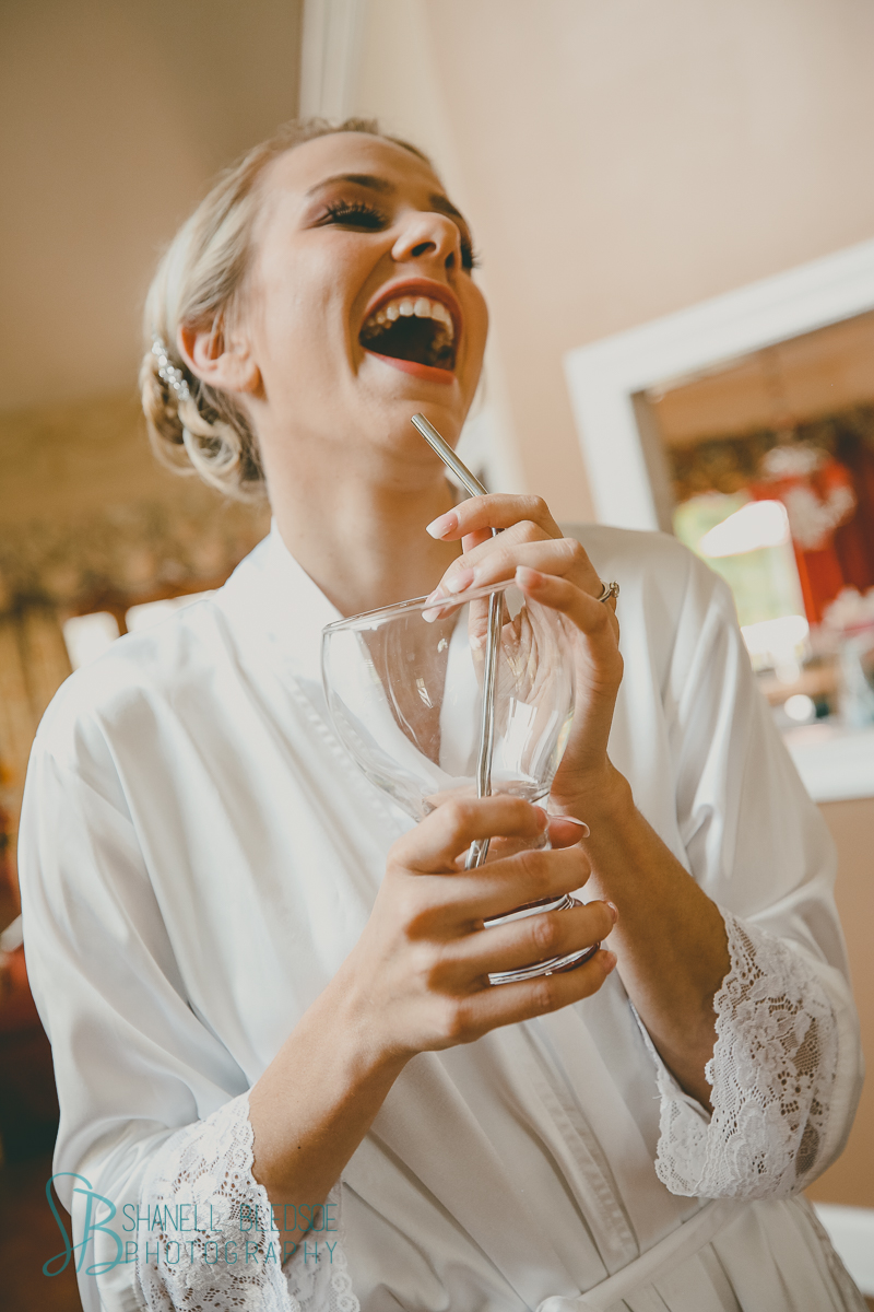 laughing bride in robe knoxville wedding photographer lafollette tn